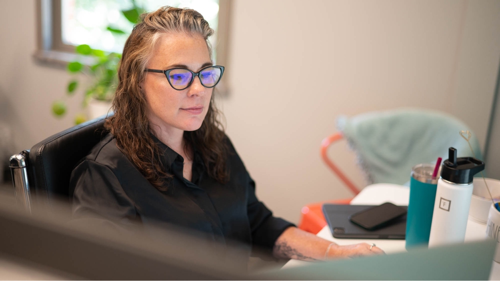 Team member working at desk.