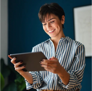 Person viewing a tablet.